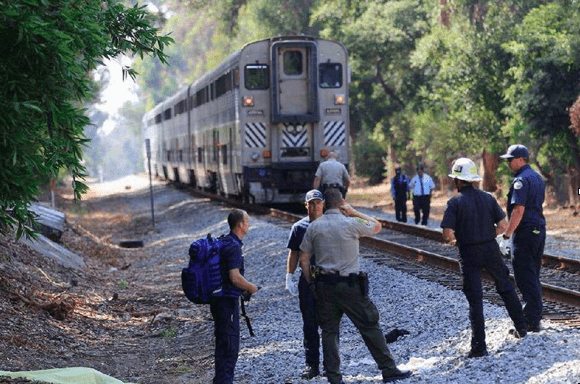 Picture of officers investigating a train accident