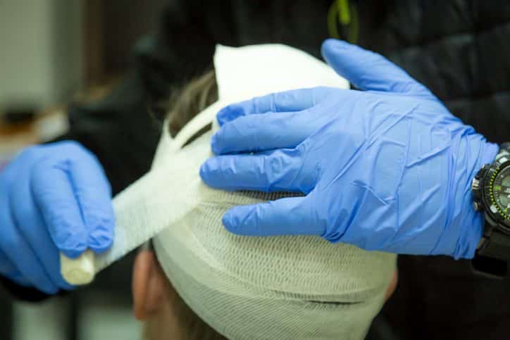 First aid training, head bandage