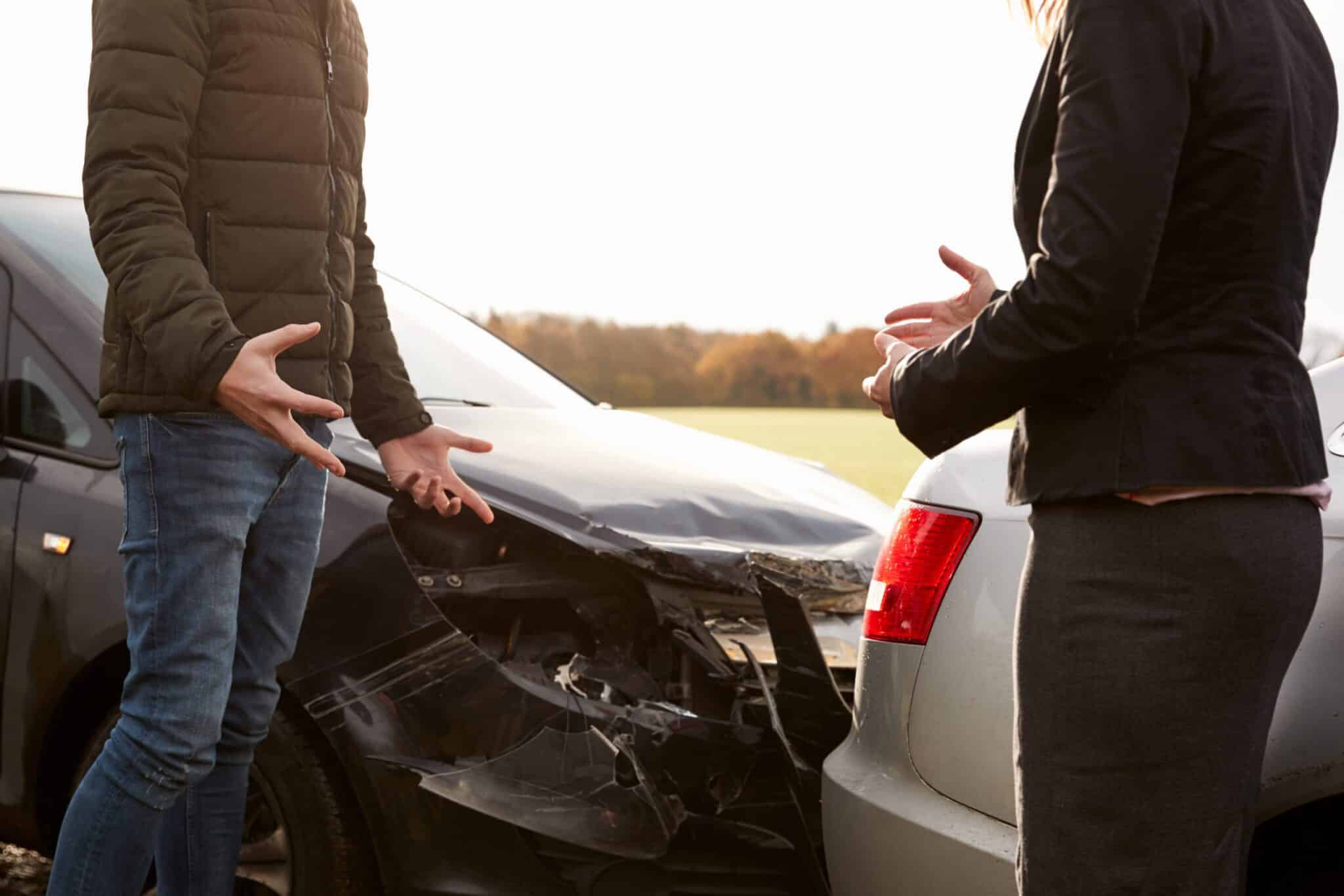 Two Drivers Arguing Over Damage To Cars After Accident